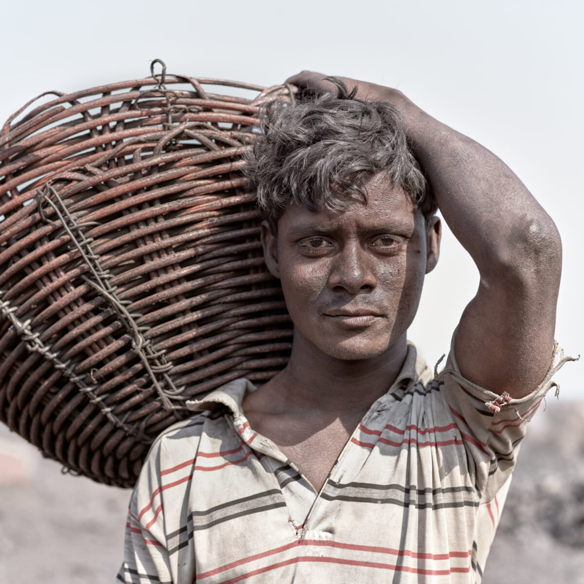 Portrait of Indian coal worker by Sebastian Sardi